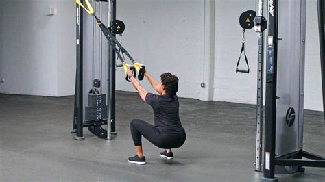 TRX squat oefening