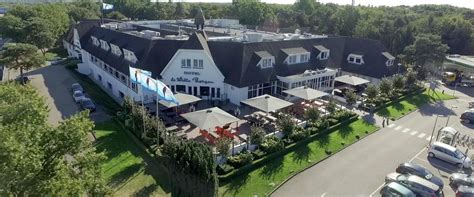 Moderne vergaderzaal met presentatiescherm in Hotel Hilversum - De Witte Bergen