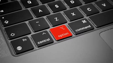 Grafische weergave van het indrukken van de Option-toets tijdens het opstarten van een Mac
