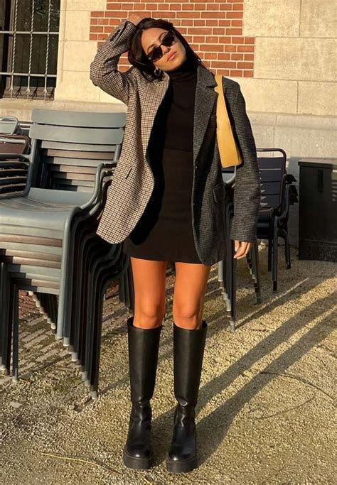Modieuze outfit met hoge laarzen