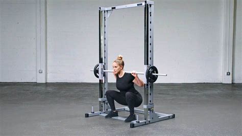 Correcte houding bij de Smith Machine Squat